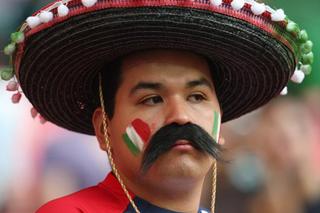 Illustration for article titled Mexico Fans Win Important Football Fancy Dress Battle